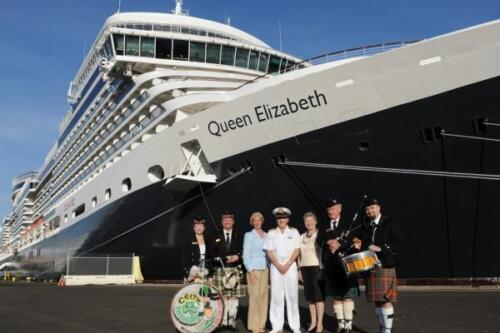 The Queen Elizabeth with Scottish Bagpipes And Drums